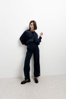 PANTALON AVEC BOUTON D'OR